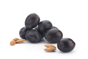 Plums on white background
