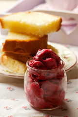 whipped blueberry butter in glass jar.