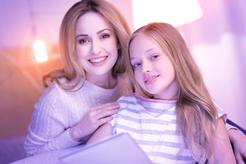 Alive mother and daughter enjoying each others company