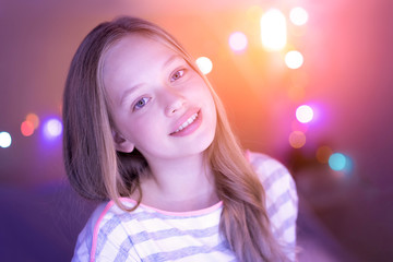 Exuberant girl smiling and her eyes shining