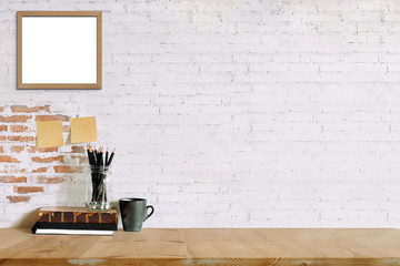 Loft workspace concept. Mock up white frame and stuff, minimal stuff on desk.