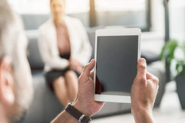Man keeping device necessary in office