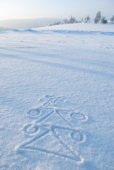Fototapeta na wymiar christmas tree symbol in the snow