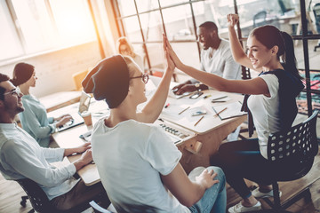 Young people work in modern office