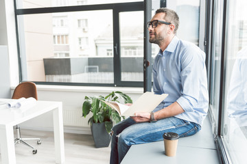 Interested man locating in office