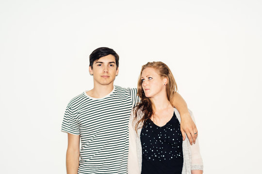 Portrait of a couple in front of a white background