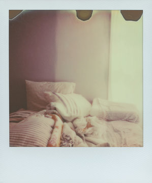 A Messy Bed and Pillows