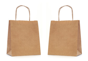 Recycled paper shopping bag on white background.