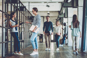 Young people work in modern office