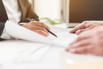 Woman arm demonstrating plan to man