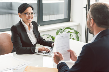 Outgoing career woman speaking with partner
