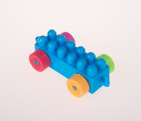 Toy. Toy block car. Toy block car on the background