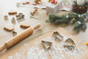 Kitchen utensil with raw Christmas cookies. Baking biscuits.