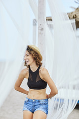 Portrait of Woman at Beach © LStockStudio