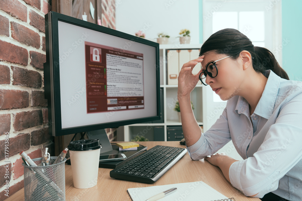 Wall mural pretty office worker lady thinking work solution