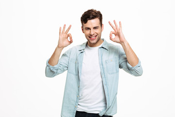 Fototapeta premium Portrait of a cheerful young man