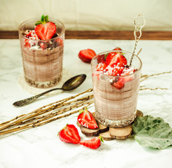 Chocolate pudding with strawberries. St. Valentine's Day dessert.