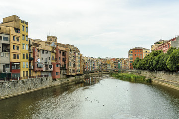Fototapeta na wymiar coloring houses in the bank of the river of the city of Gerona, Spain.