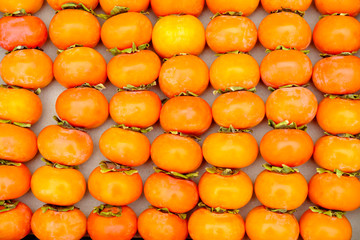 Persimmons fruit at the farmers market