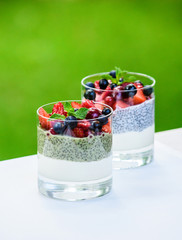 Chia seed pudding breakfast with summer berries. Healthy food concept.