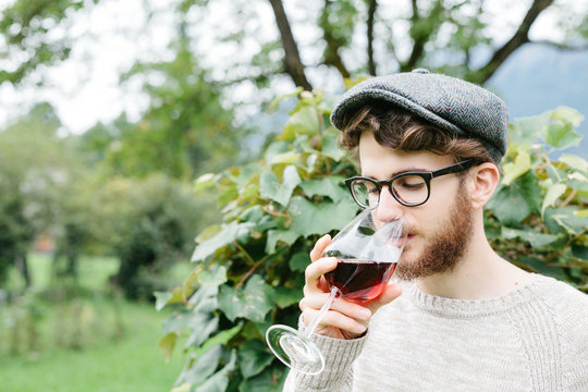 Handsome Man Portrait With Glass of Wine