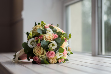 beautiful bridal bouquet lying on the table, a beautiful wedding bouquet, autumn flowers