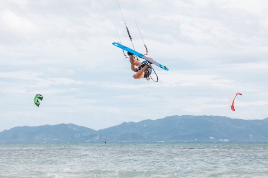 Kitesurfer Doing Acrobatic Moves