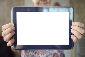 elder woman holding tablet