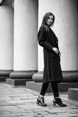 Girl in a coat black and white photo