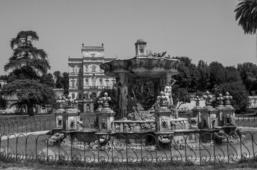 Antique old fountain in the park Giardino Del Teatro of Villa Doria-Pamphili in Rome, Italy
