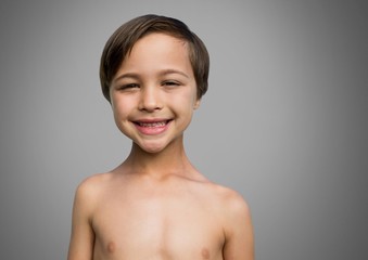 Obraz premium Boy against grey background smiling