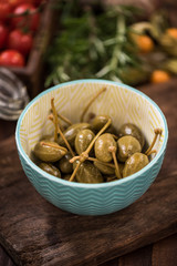 Whole Capers in bowl,spanish tapa bar food