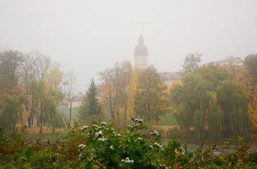 Naklejka premium The Palace and castle complex in Nesvizh, Belarus. Nesvizh castle. Castle of Radzivil. Nesvizhsky castle in the autumn