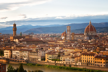 Fototapeta na wymiar Florence, river embankment of Arno and Cathedral of Santa Maria del Fiore