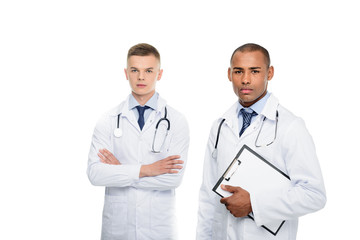 Fototapeta premium multiethnic male doctors with stethoscopes