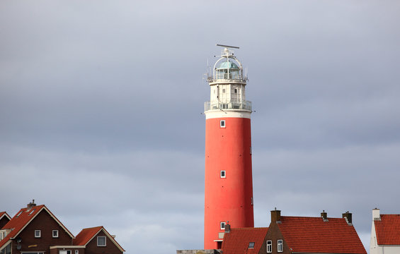 Red lighthouse in late sunlight