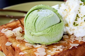Honey Santos with green tea icecream in  green plate