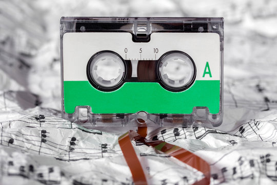 Audio cassette on the music sheet