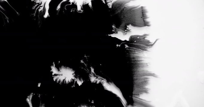 Beautiful ink flowing swirls on white background