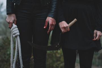 Two woman preparing to kill, halloween concept