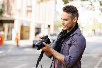 Male photographer taking picture
