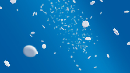 Falling pills with blue gradient background