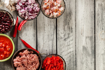 Ingredients ready for preparing chili con carne. Mincemeat, papr