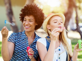 Two women friends in park