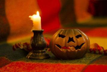 Ceramic pumpkin and candle