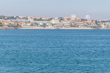 Fototapeta premium Beach, sand and houses in Cascais