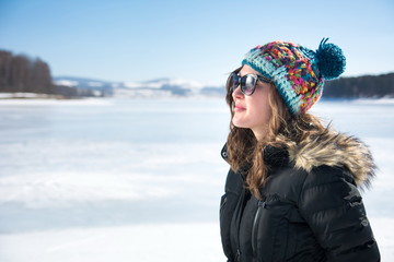 Fototapeta na wymiar Girl on a frozen lake
