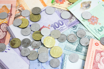 Closeup shot of Ringgit Malaysia banknotes  and coins