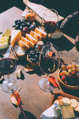 red wine with various snacks