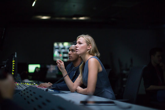Operators in a control room at a television studio